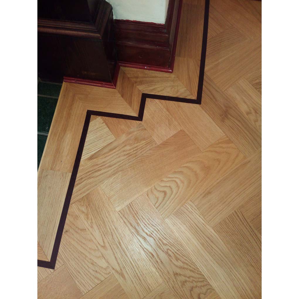 Rustic parquet flooring herringbone pattern lifestyle